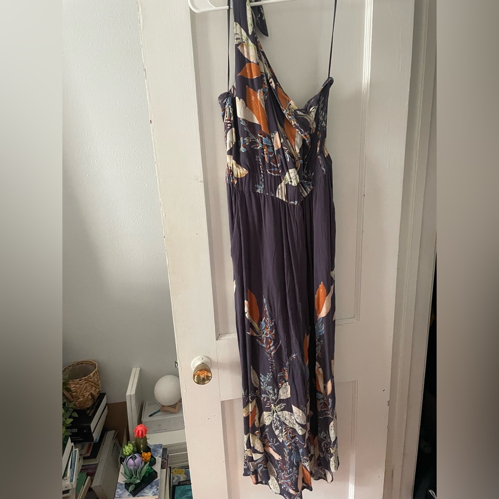 Very cute Free People Jumpsuit! Only worn a couple of times!